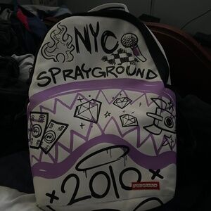 Limited spray ground back pack